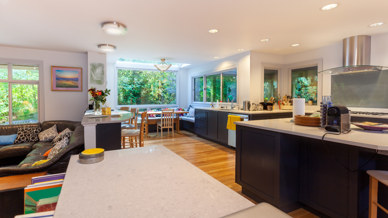 Eco-Friendly Whole Home Renovation Kitchen With Energy-Efficient Lighting And Recycled Countertops