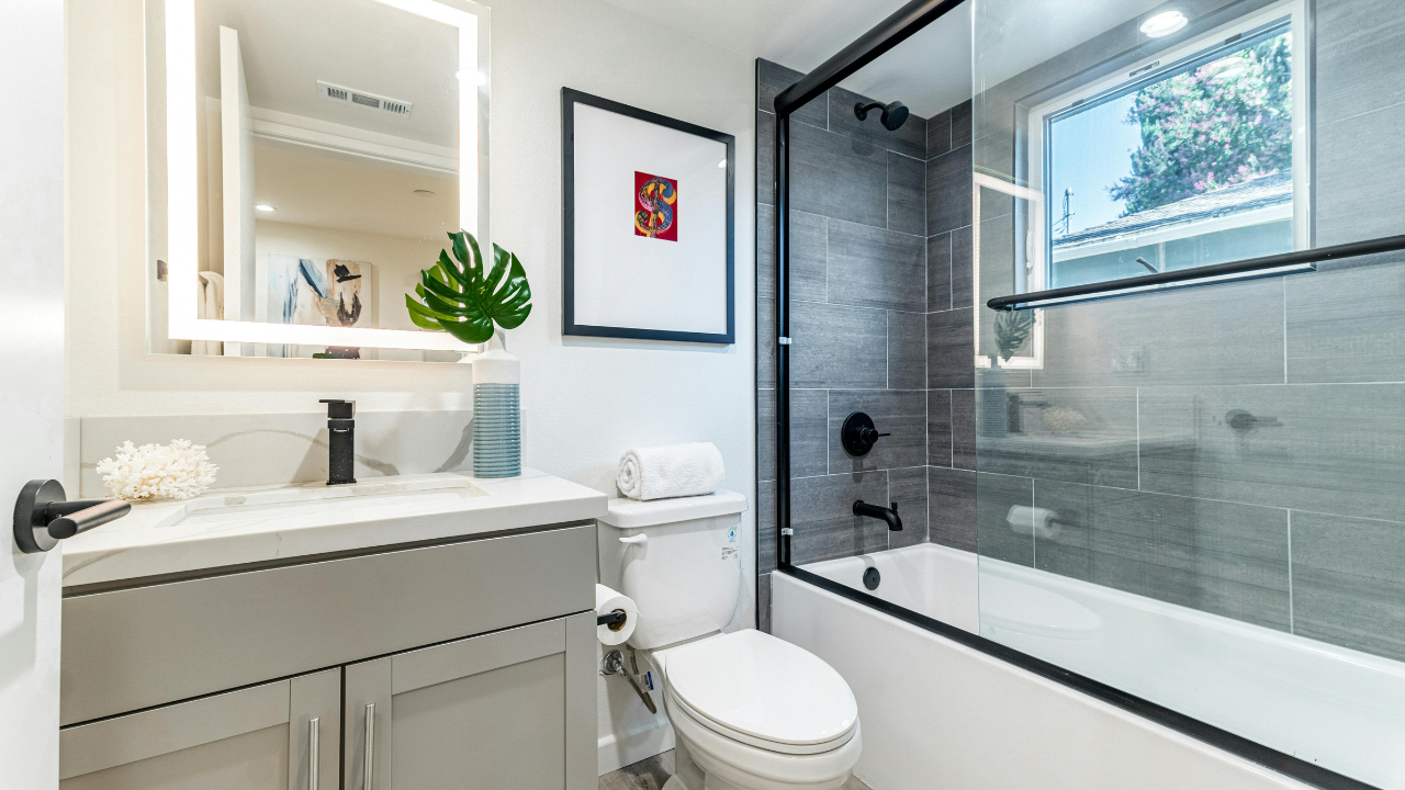 Creative lighting solutions enhancing a compact kitchen remodel with warm, layered lighting